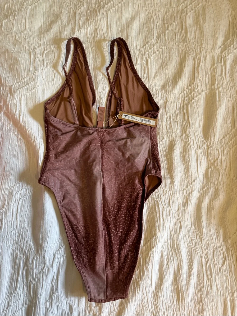 Skims Plunge One-Piece Swimsuit in Dusty Rose
